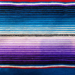 Gestreifter Poncho Saltillo (Kind)