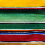 Gestreifter Poncho Saltillo (Kind)