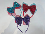 Diadema con lazo de lentejuelas